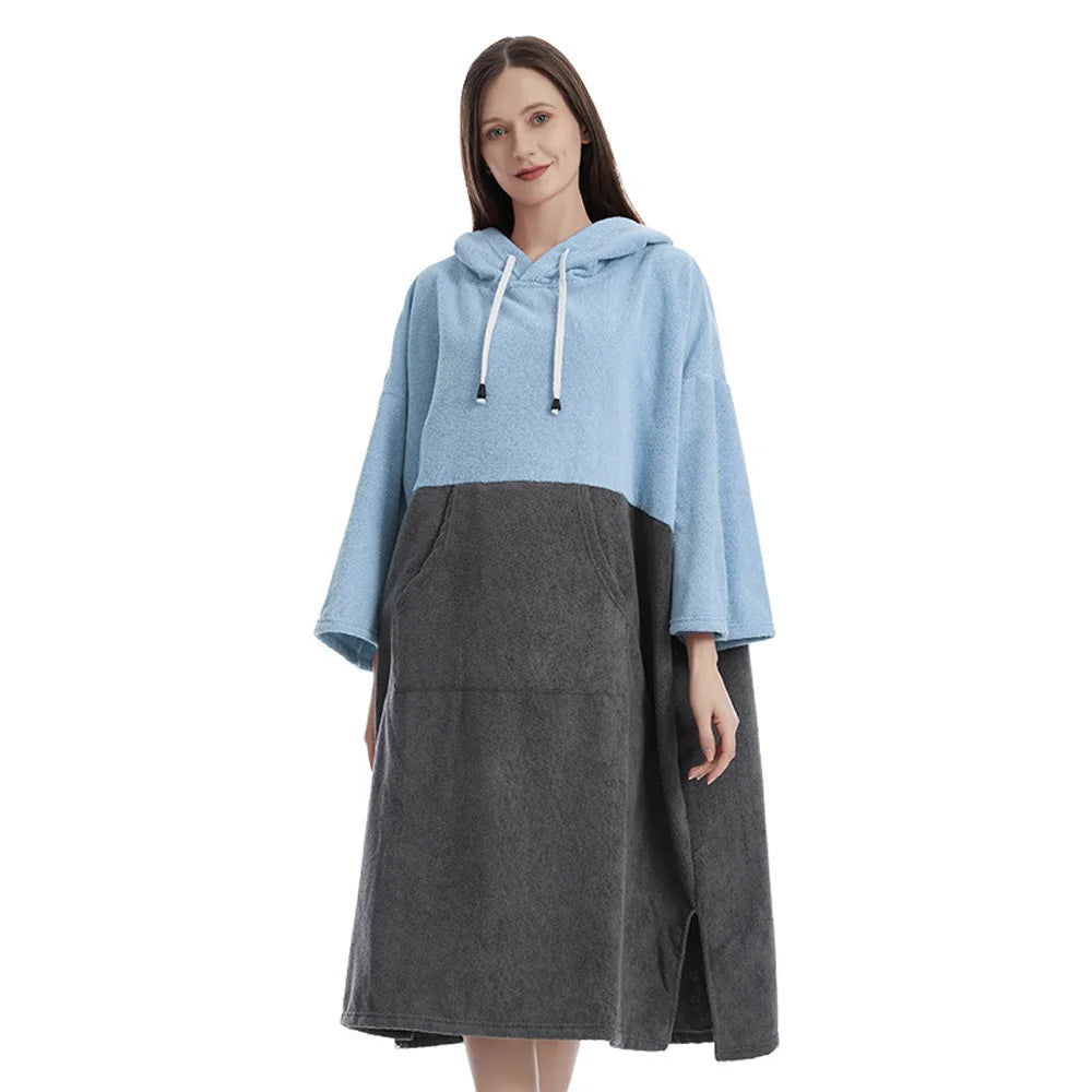 Quick-Dry Hooded Towel Poncho in blue and gray, ideal for beachgoers and surfers, offering comfort and warmth.